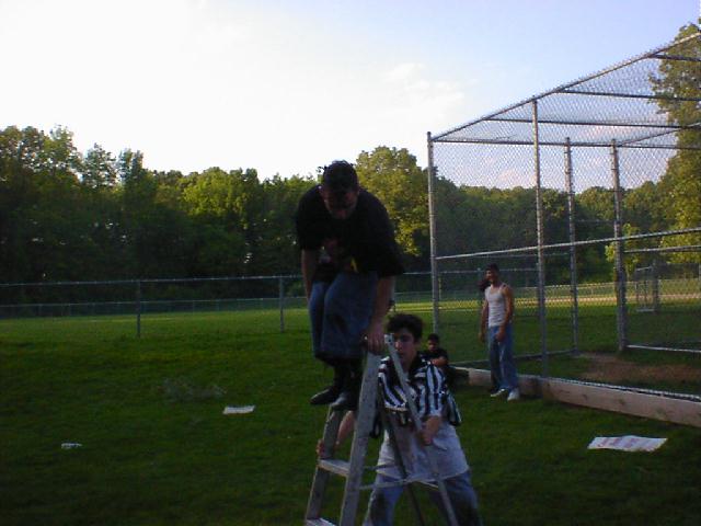 Psychopathic Kid climbs teh ladder!